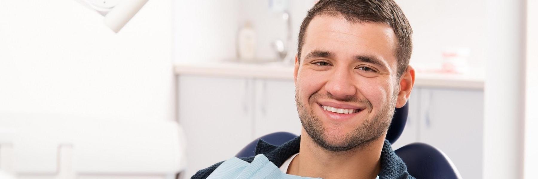 Man smiling in dental chair